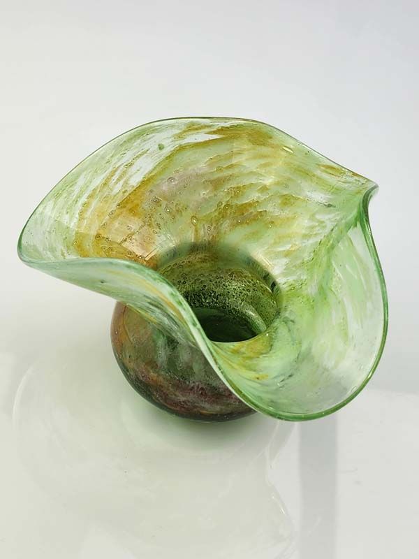Glass: Green hand blown glass vase