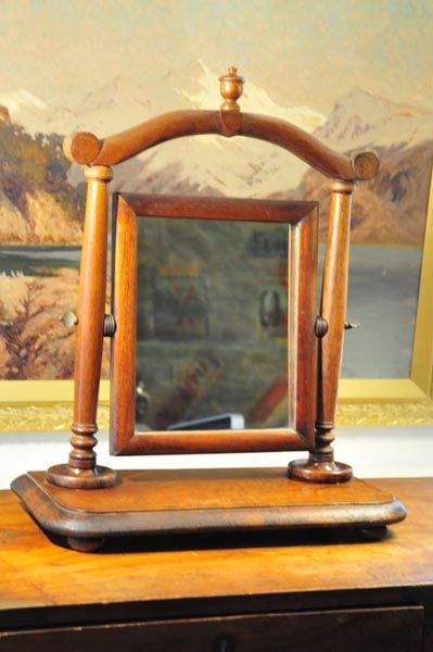 Antique toilet mirror