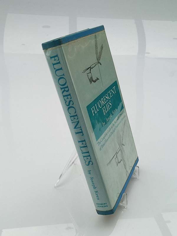 Antique books: Fluorescent Flies