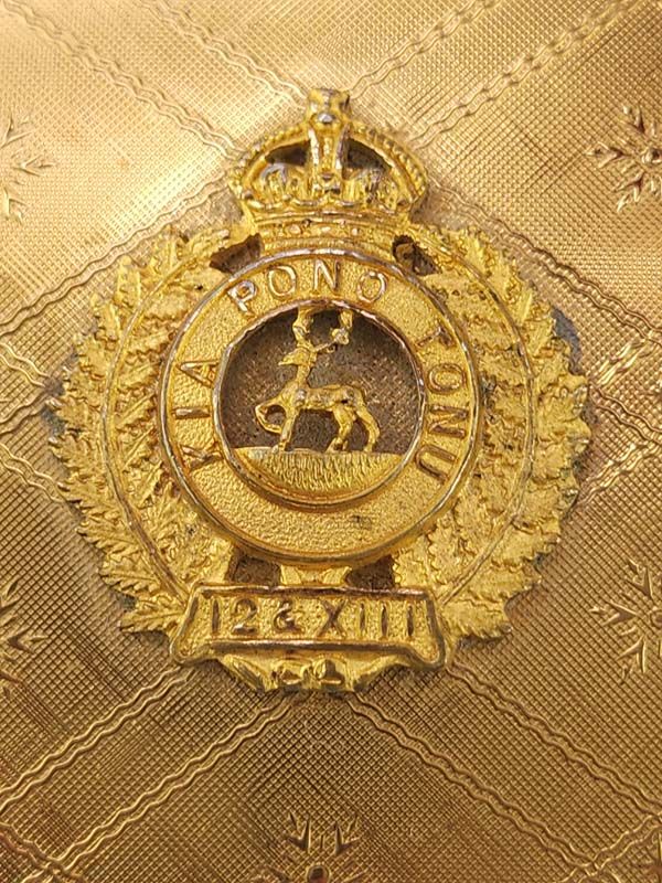 Curios: KIGU Compact with WW2 Badge