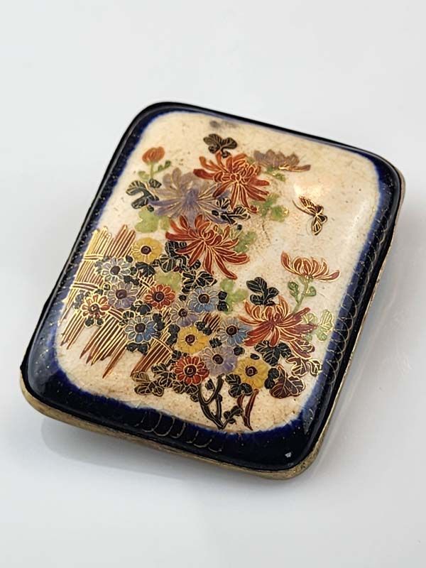 Satsuma Buckle - floral and butterfly