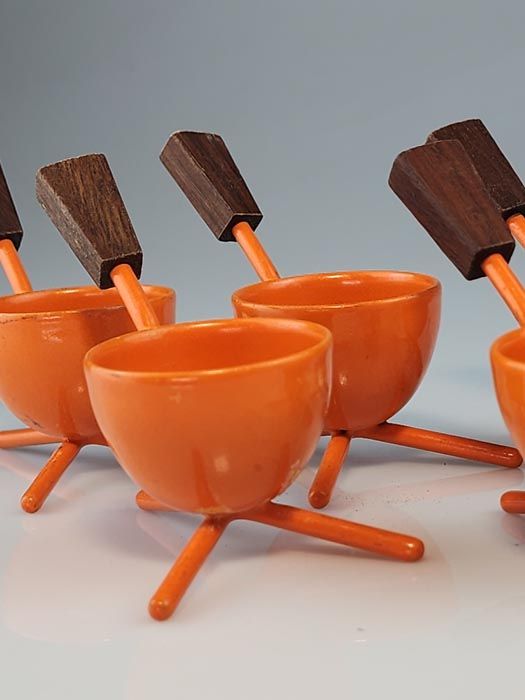 Six orange atomic retro egg cups
