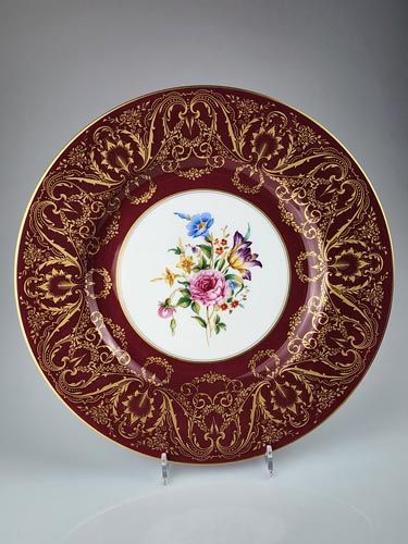 Royal Worcester Plate, Flower posy maroon gilt.